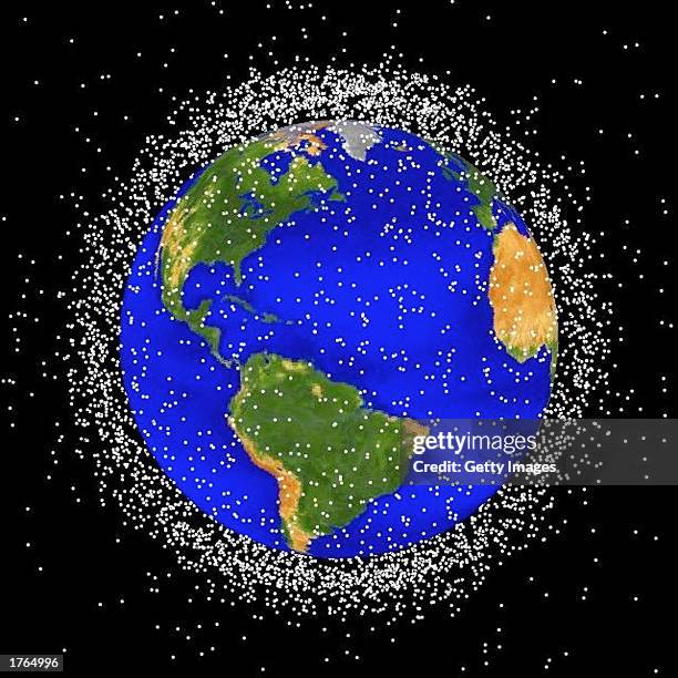 This National Aeronautics and Space Administration handout image shows a graphical representation of space debris in low Earth orbit. According to...