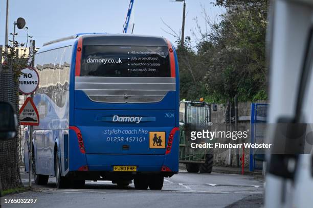 Coach arrives at the port prior to Lloyd Russell-Moyle MP for Brighton Kemptown attempting to gain access to the Bibby Stockholm immigration barge at...