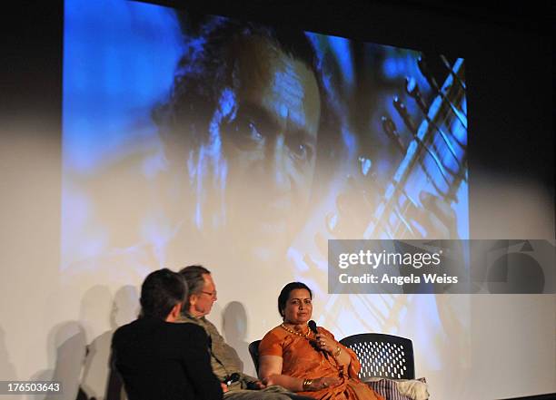 Vice President of the GRAMMY Foundation Scott Goldman, filmmaker Alan Kozlowski and Ravi Shankar's wife Sukanya Shankar onstage during Reel To Reel:...