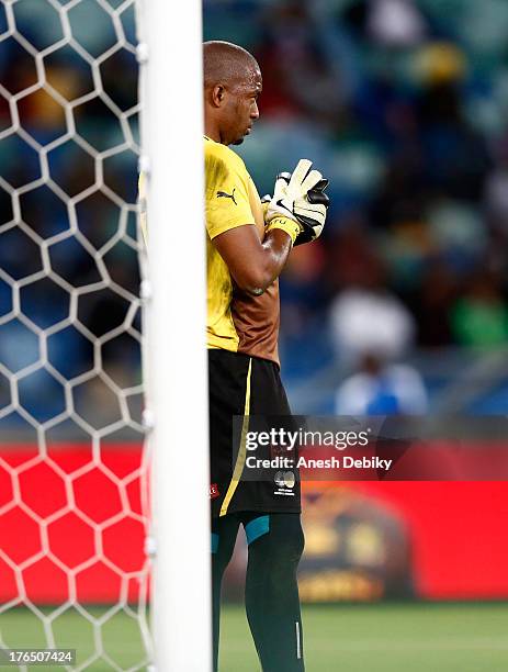 Goalkeeper Itumeleng Khune of South Africa looks on from the goal mouth during the 2013 Nelson Mandela Challenge match between South Africa and...