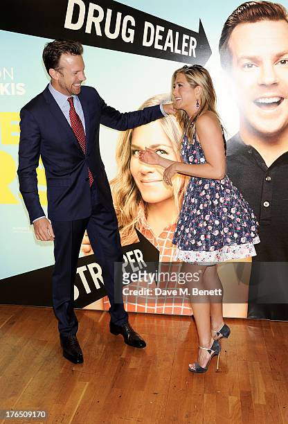 Jason Sudeikis and Jennifer Aniston attend the European Premiere of 'We're The Millers' at Odeon West End on August 14, 2013 in London, England.