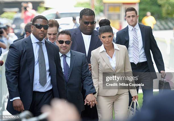 Giuseppe "Joe" Giudice and wife Teresa Giudice appear in court to face charges of defrauding lenders, illegally obtaining mortgages and other loans...