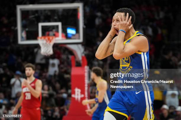 Golden State Warriors guard Stephen Curry reacts after making a three-point shot during the second half of an NBA game Sunday, Oct. 29 at the Toyota...