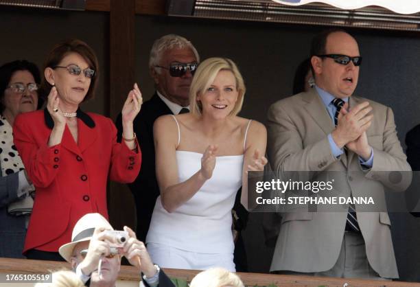 Prince Albert II of Monaco , Charlene Wittstock and Princess Elisabeth-Anne De Massy applaud at the end of the Monte Carlo ATP Masters Series...