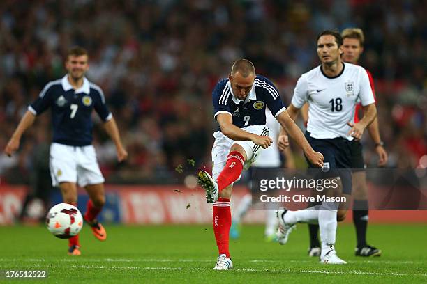 Kenny Miller of Scotland scores a goal during the International Friendly match between England and Scotland at Wembley Stadium on August 14, 2013 in...