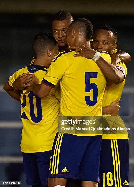 Freddy Guarin of Colombia celebrates after scoring with his teammates Camilo Zuiga , Aldo Leao Ramirez and Macnelly Torres the goal during the...