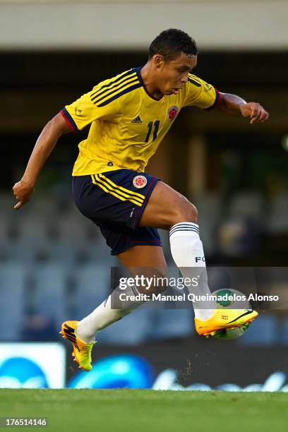 Luis Muriel of Colombia controls the ball during the International Friendly match between Colombia and Serbia at the Mini Estadi Stadium on August...