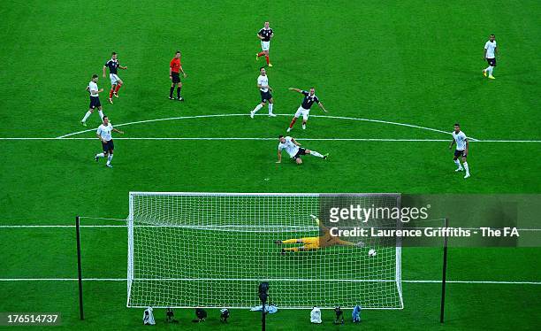 Kenny Miller of Scotland scores his side's second goal past Joe Hart of England during the International Friendly match between England and Scotland...