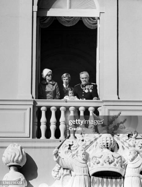 Prince Albert of Monaco , Princess Grace, Prince Rainier III and Princess Stephanie stand 20 November 1971 on the balcony of princely palace while...