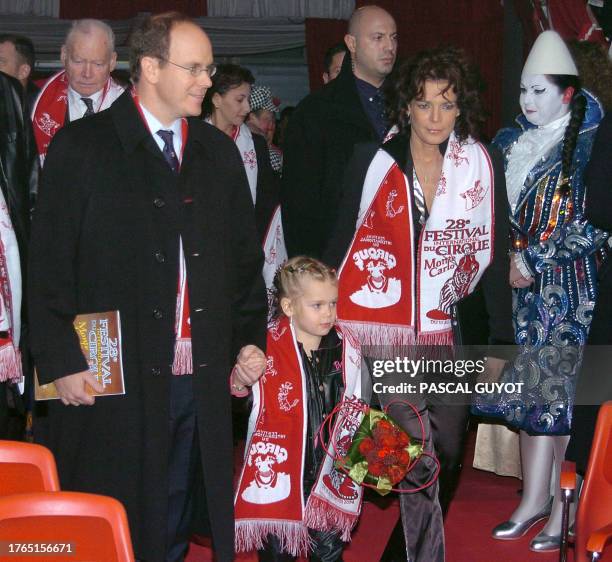 Princesse Stephanie of Monaco and Prince Albert of Monaco , holding the hand of Stephanie daughter Camille, arrive 15 January 2004 for the 28th...