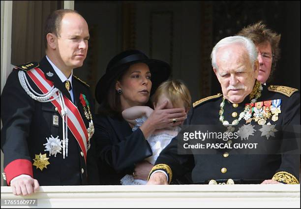 Monaco's Prince Rainier III stands with his daughter Princess Caroline of Hanover , her husband, Prince Ernst August of Hanover and their daughter,...