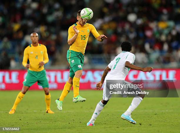 Dean Furman of South Africa heads the ball during the 2013 Nelson Mandela Challenge match between South Africa and Nigeria at Moses Mabhida Stadium...