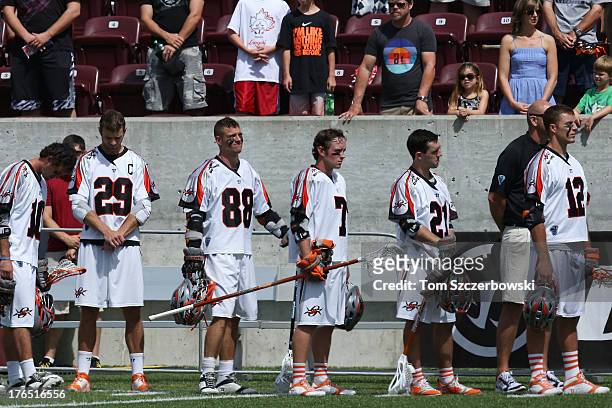Chris Bocklet and Lee Zink and Zack Greer and Matt Bocklet and Will Mangan and Justin Turri of the Denver Outlaws stand for the playing of the...