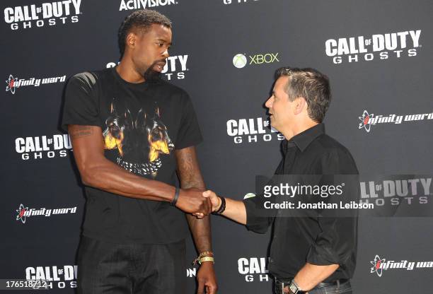 DeAndre Jordan, Pro Basketball Player for the LA Clippers and President and Chief Executive Officer of Activision Eric Hirshberg attend "Call Of...