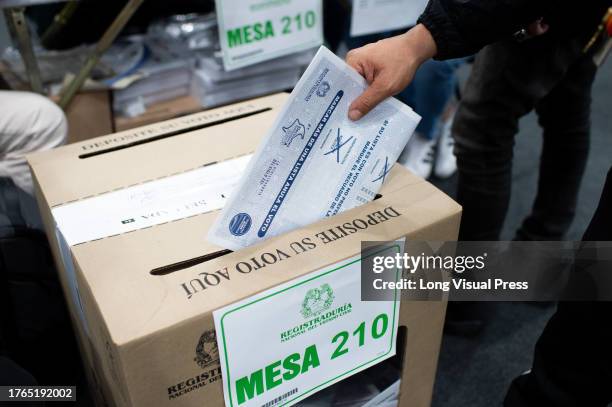 People rally to vote during Colombia's regional elections to choose the new Mayors, Governors and Council Members for the cities, in Bogota,...