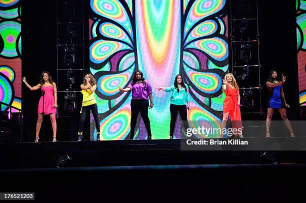 Singers Aubrey Cleland, Angie Miller, Candice Glover, Kree Harrison, Jennel Arthur, and Amber Holcomb perform during American Idol Live! 2013 at...