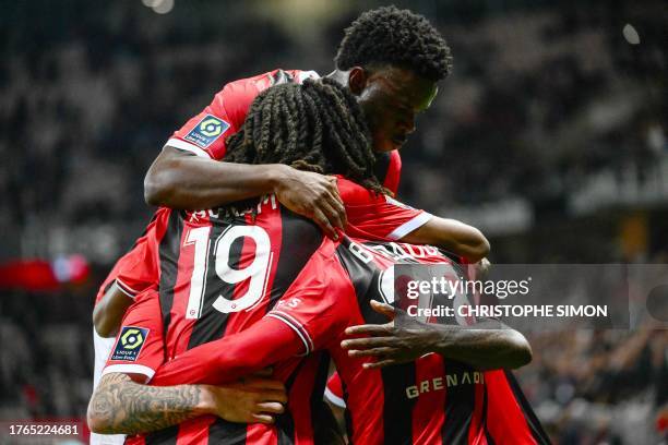 Nice's players celebrate after Ivorian forward Jeremie Boga scored his team's first goal during the French L1 football match between OGC Nice and...