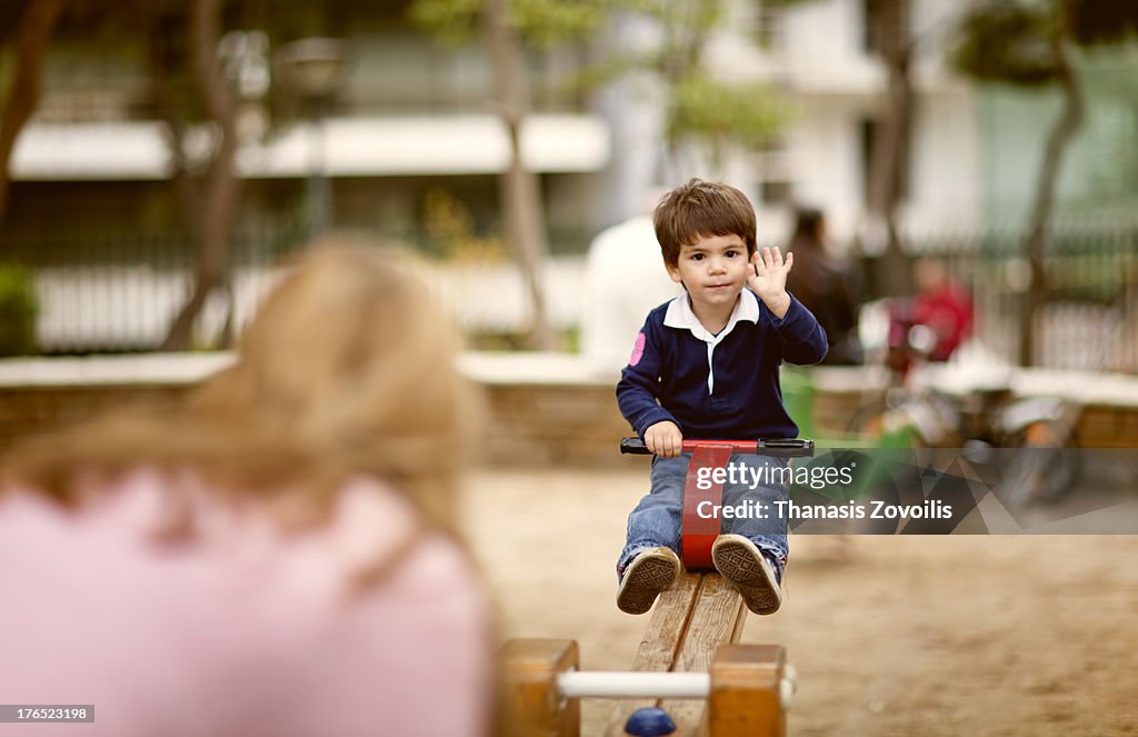 Portrait of a small boy playing in a playgroup