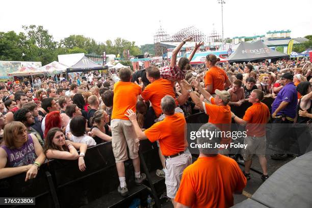 General view of the crowd from The Monster Energy Drink stage while Oh, Sleeper performs during the 2013 Van Warped Tour at Riverbend Music Center on...