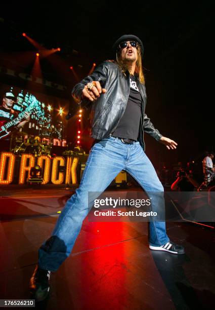 Kid Rock performs during the $20 Best Night Ever Tour at DTE Energy Music Theater on August 14, 2013 in Clarkston, Michigan.