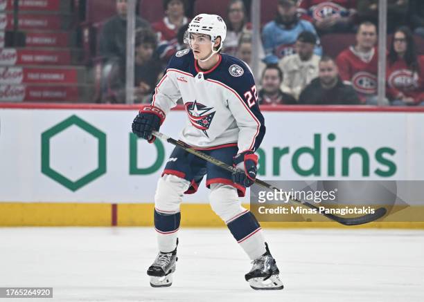 Jake Bean of the Columbus Blue Jackets skates during the first period against the Montreal Canadiens at the Bell Centre on October 26, 2023 in...