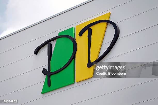 The Prime Delica Co. Logo is displayed at the company's factory in Ryugasaki, Ibaraki Prefecture, Japan, on Wednesday, Aug. 14, 2013. Prime Delica...