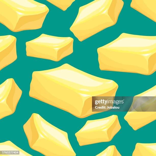 delicious stick of butter seamless background - caramel block stock illustrations