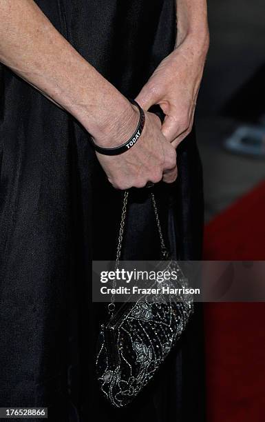 Actress Melanie Griffith arrives at the Premiere Of "Dark Tourist" at ArcLight Hollywood on August 14, 2013 in Hollywood, California.