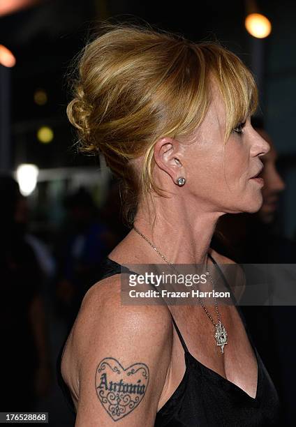 Actress Melanie Griffith arrives at the Premiere Of "Dark Tourist" at ArcLight Hollywood on August 14, 2013 in Hollywood, California.