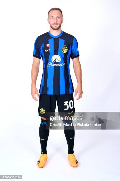 Carlos Augusto of FC Internazionale pose for a photo during the FC Internazionale Milano official media day at Appiano Gentile on August 17, 2023 in...