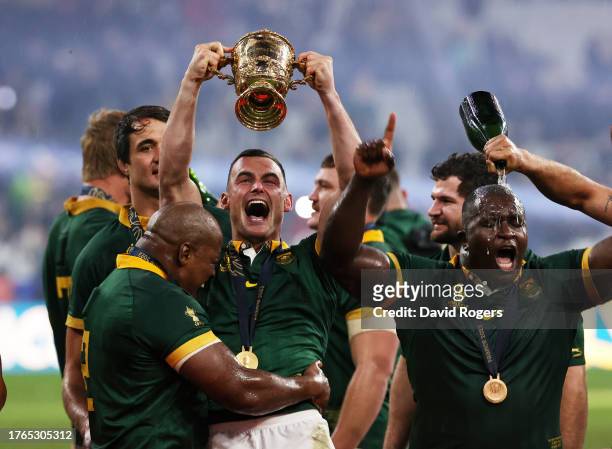 Jesse Kriel of South Africa, raises the Webb Ellis Cup after their victory during the South Africa captain's run held at Stade des Fauvettes ahead of...