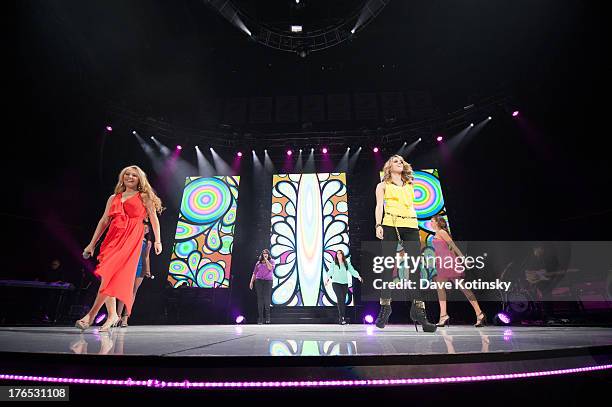 Singers Aubrey Cleland, Angie Miller, Candice Glover, Kree Harrison, Jennel Arthur, and Amber Holcomb performs during American Idol Live! 2013>> at...
