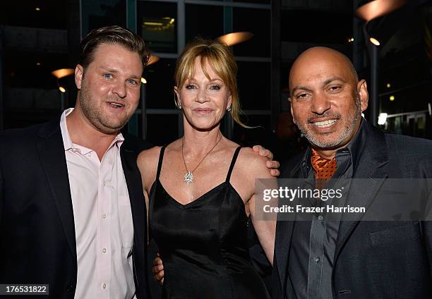 Produer Zachery Ty Bryan , actress Melanie Griffith, director Suri Krishnamma arrives at the Premiere Of "Dark Tourist" at ArcLight Hollywood on...