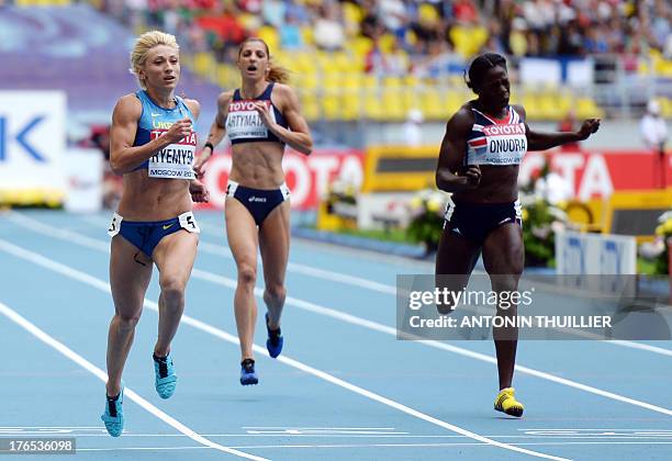 Ukrain's Mariya Ryemyen competes during the women's 200 metres event at the 2013 IAAF World Championships at the Luzhniki stadium in Moscow on August...