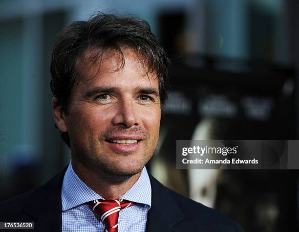 Actor Matthew Settle arrives at the premiere of "Dark Tourist" at ArcLight Hollywood on August 14, 2013 in Hollywood, California.