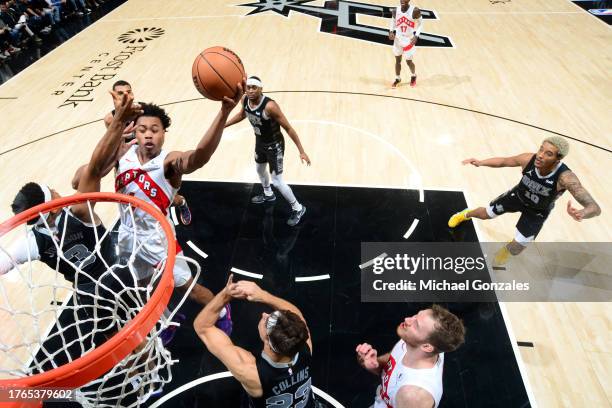 Scottie Barnes of the Toronto Raptors drives to the basket during the game against the San Antonio Spurs on November 5, 2023 at the Frost Bank Center...