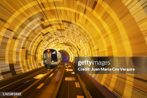 Subway Train in Motion at C Eighth Avenue Local. Speeding Train in New York City Subway Subway railroad tracks, NYC, New York, USA Subway Train in Motion at C Eighth Avenue Local. Speeding Train in New York City Subway Subway railroad tracks, NYC, New York, USA