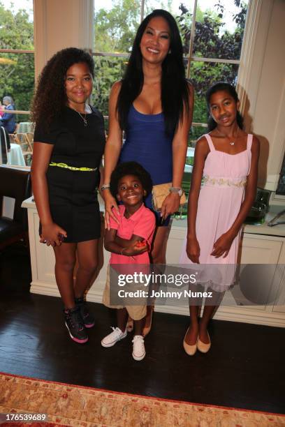 Ming Lee Simmons, Kimora Lee Simmons, Aoki Simmons and Kenzo Lee Hounsou attend the Foundation For Ethnic Understanding Benefit on August 14, 2013 in...