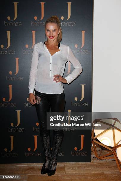 Lauren Eagle arrives at the launch of Jennifer Hawkins new self-tanning range 'J-Bronze' at Bondi Beach on August 15, 2013 in Sydney, Australia.