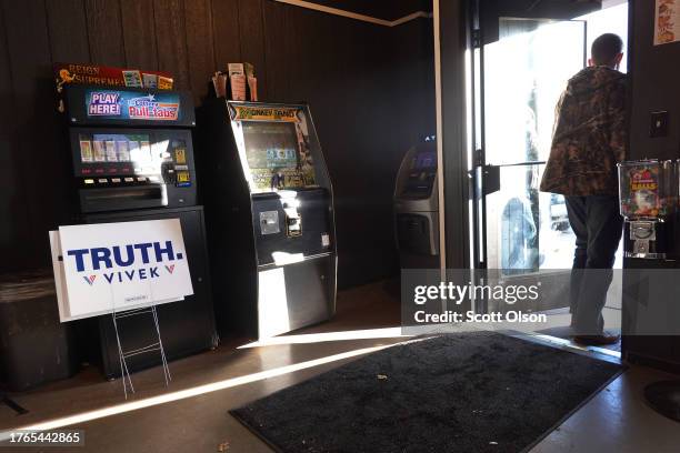 Campaign yard signs sit inside Vande's Bar & Grill where Republican presidential candidate businessman Vivek Ramaswamy is scheduled to speak on...