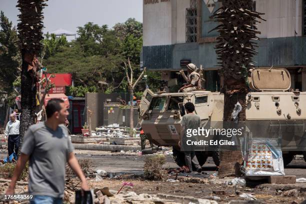 An Egyptian Military armoured vehicle is parked outside the Rabaa al-Adaweya Mosque in Nasr City on August 15, 2013 in Cairo, Egypt. An unknown...