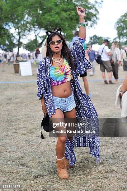 Blogger and DJ Bip Ling wears Ugg boots and bag, Hudson shorts, Adhoc cat ears, Raged Priest Top, Vintage sunglasses and a Japanese Kimono on day 4...