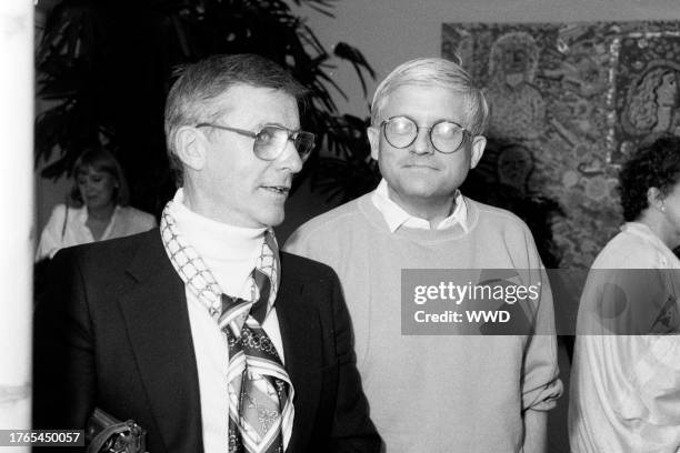 Roddy McDowall and David Hockney attend a party in Beverly Hills, California, on June 25, 1987.