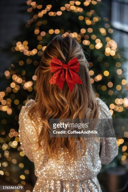 girl with long blondie hair and red bow hair - hair bow stock pictures, royalty-free photos & images