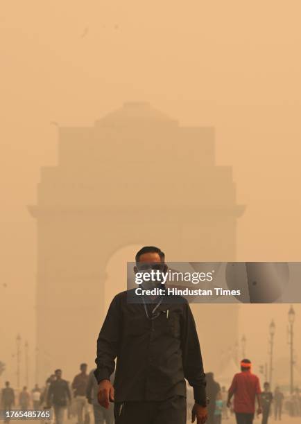 Visitors wearing mask at Kartavya Path , Heavy smog engulf the city as AQI turns " Severe Plus " on November 5, 2023 in New Delhi, India. Stringent...