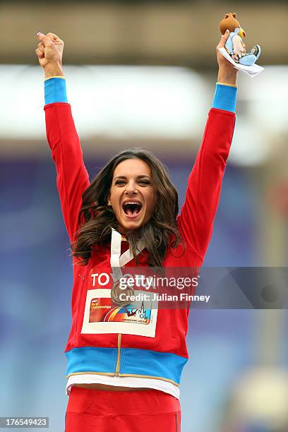 Gold medalist Elena Isinbaeva of Russia poses on the podium during the medal ceremony for the Women's Pole Vault during Day Six of the 14th IAAF...