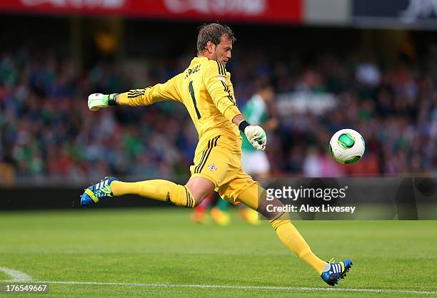 Roy Carroll of Northern Ireland clears the ball during the FIFA 2014 World Cup Group F Qualifier match between Northern Ireland and Russia at Windsor...