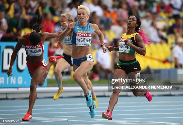 Jamaica's Shelly-Ann Fraser-Pryce leads Ukraine's Mariya Ryemyen during the women's 200 metres semi-final at the 2013 IAAF World Championships at the...