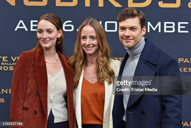 Maria Ehrich, Amelie Plaas-Link and Lion Wasczyk attend the "Die Tribute von Panem - The Ballad of Songbirds and Snakes" European premiere at Zoo...