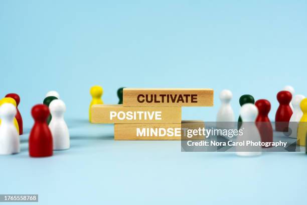 cultivate positive mindset text on wood block - health motivational quotes stock pictures, royalty-free photos & images